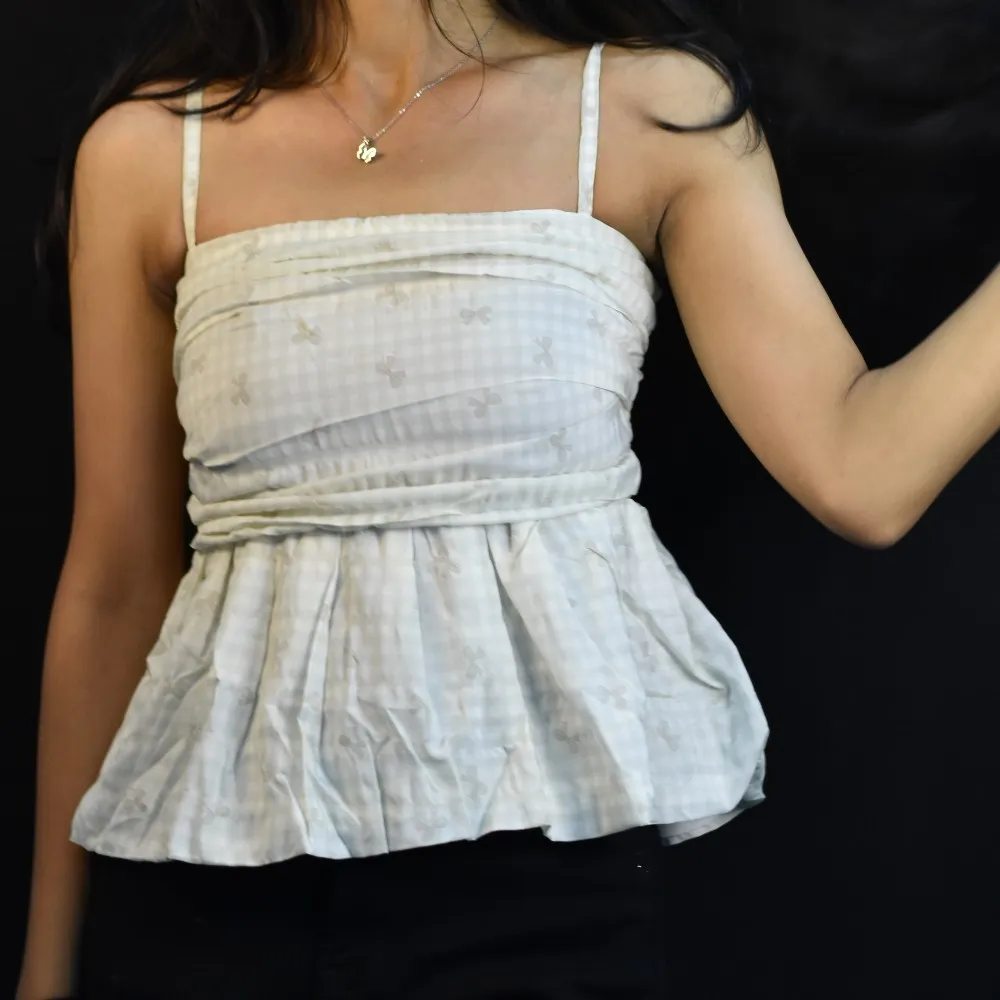 NYVAZ Women's Ivory Bow Embroidered Peplum Cami Top