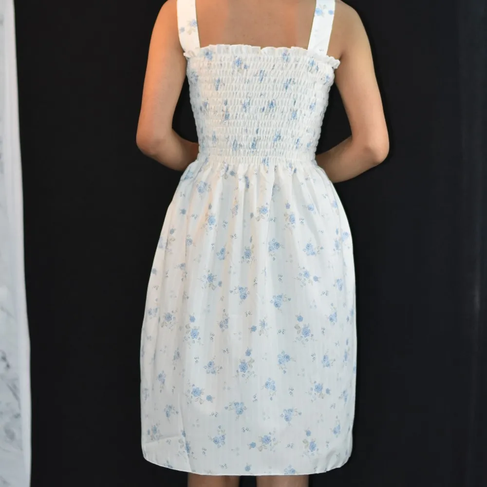 NYVAZ Women's Blue Blossom Smocked Midi Dress