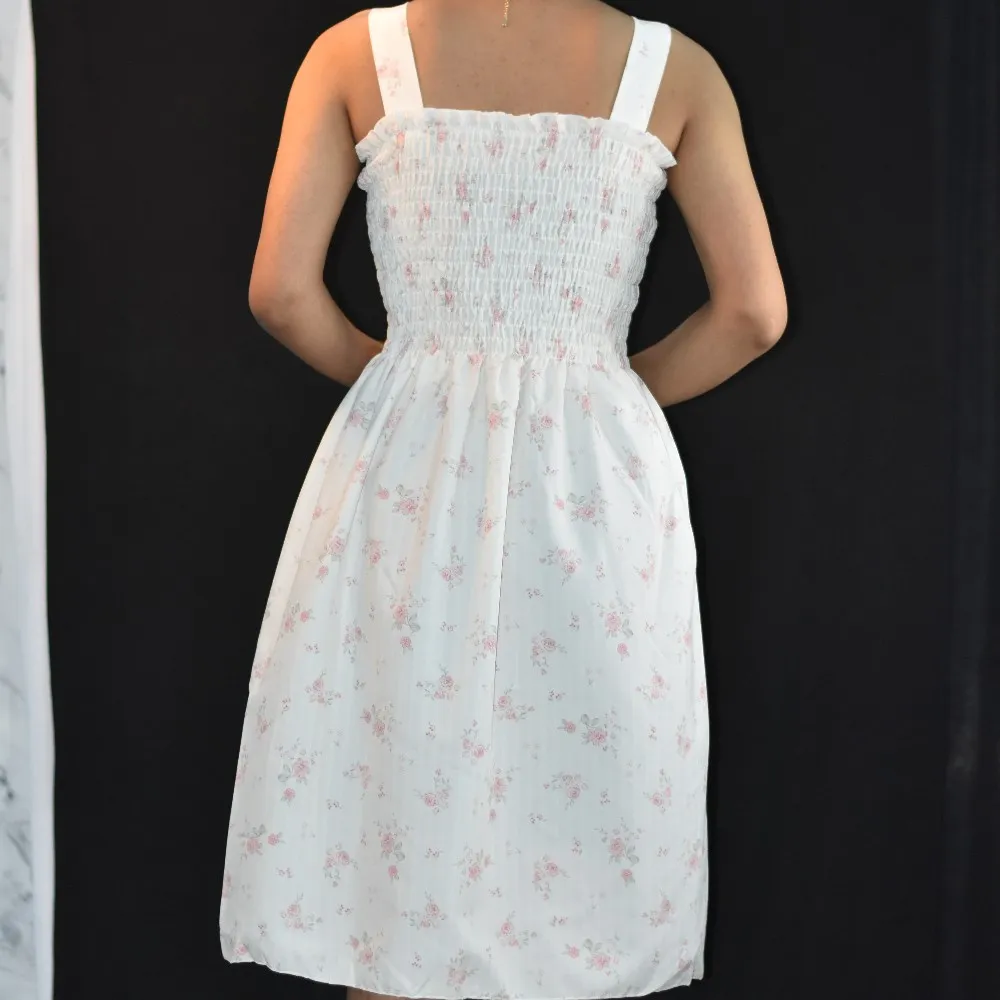 White with Soft Pink Floral Print NYVAZ Women's Pink Blossom Smocked Midi Dress